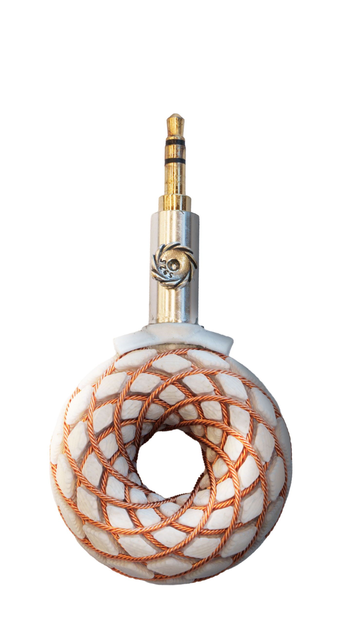 Uncapped OTORUS ring showing its copper winding and attached connector